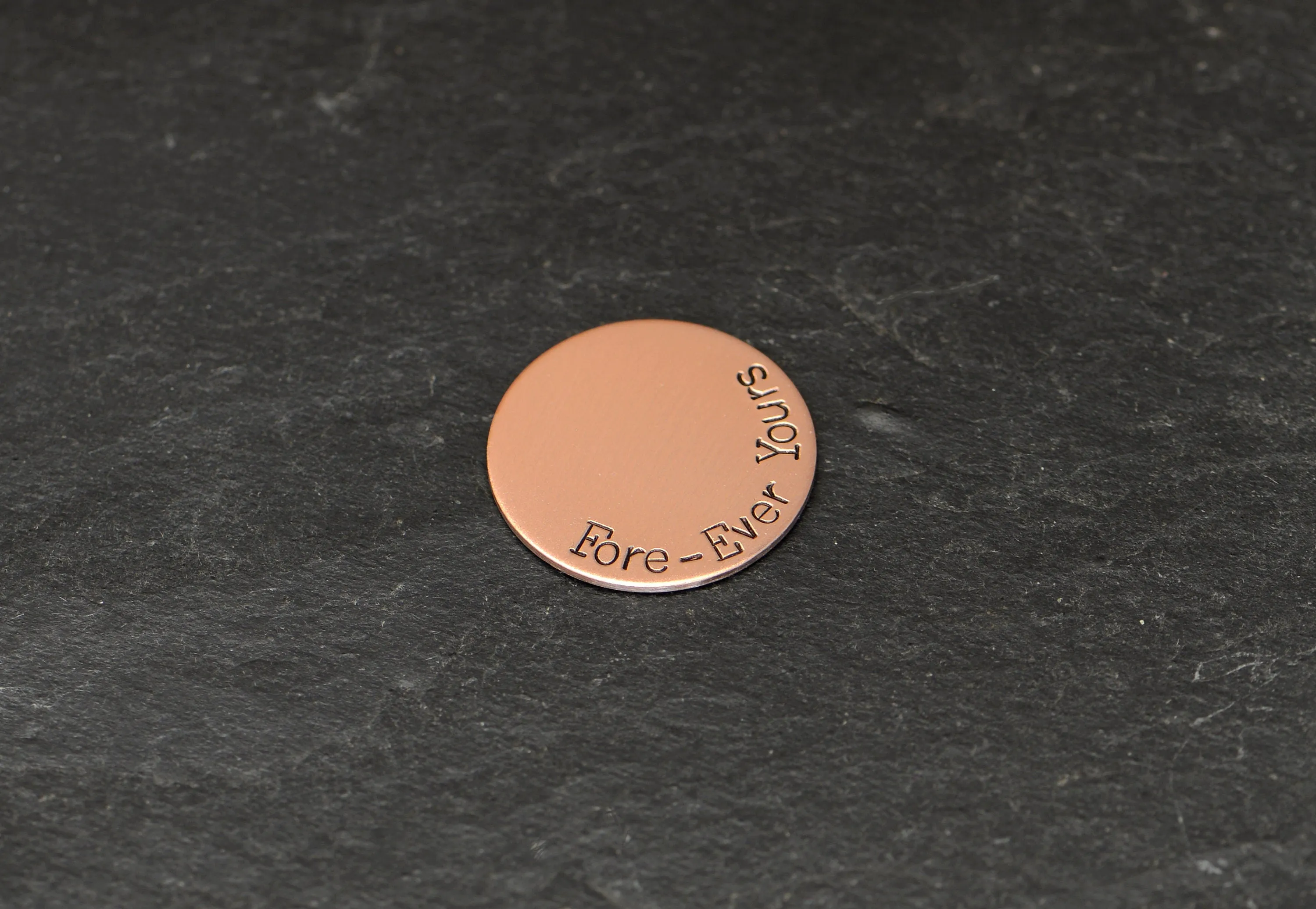 Copper golf ball marker with Fore ever yours