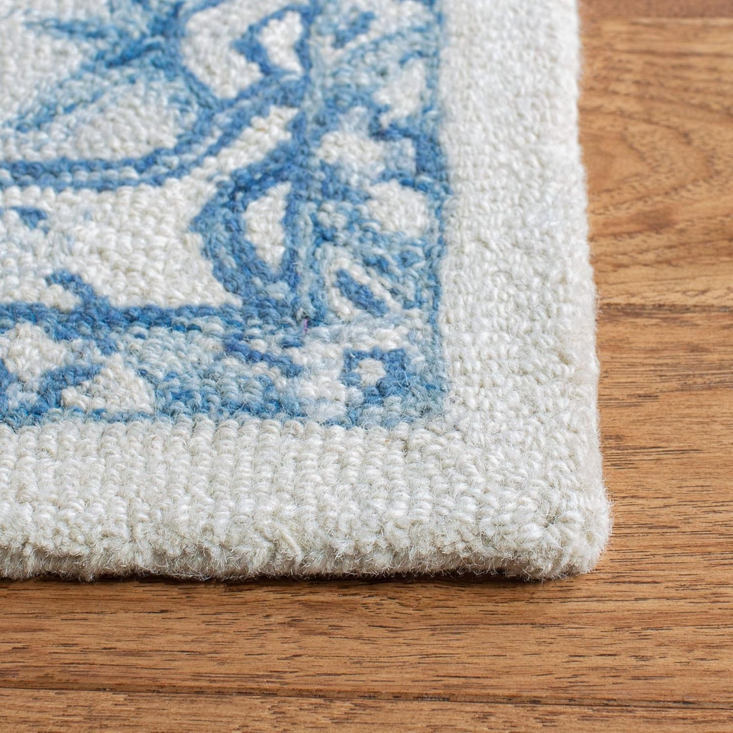 SAFAVIEH Micro-Loop Collection Area Rug - 8' x 10', Ivory & Blue, Handmade Shabby Chic Medallion Wool, Ideal for High Traffic Areas in Living Room, Bedroom (MLP503G)