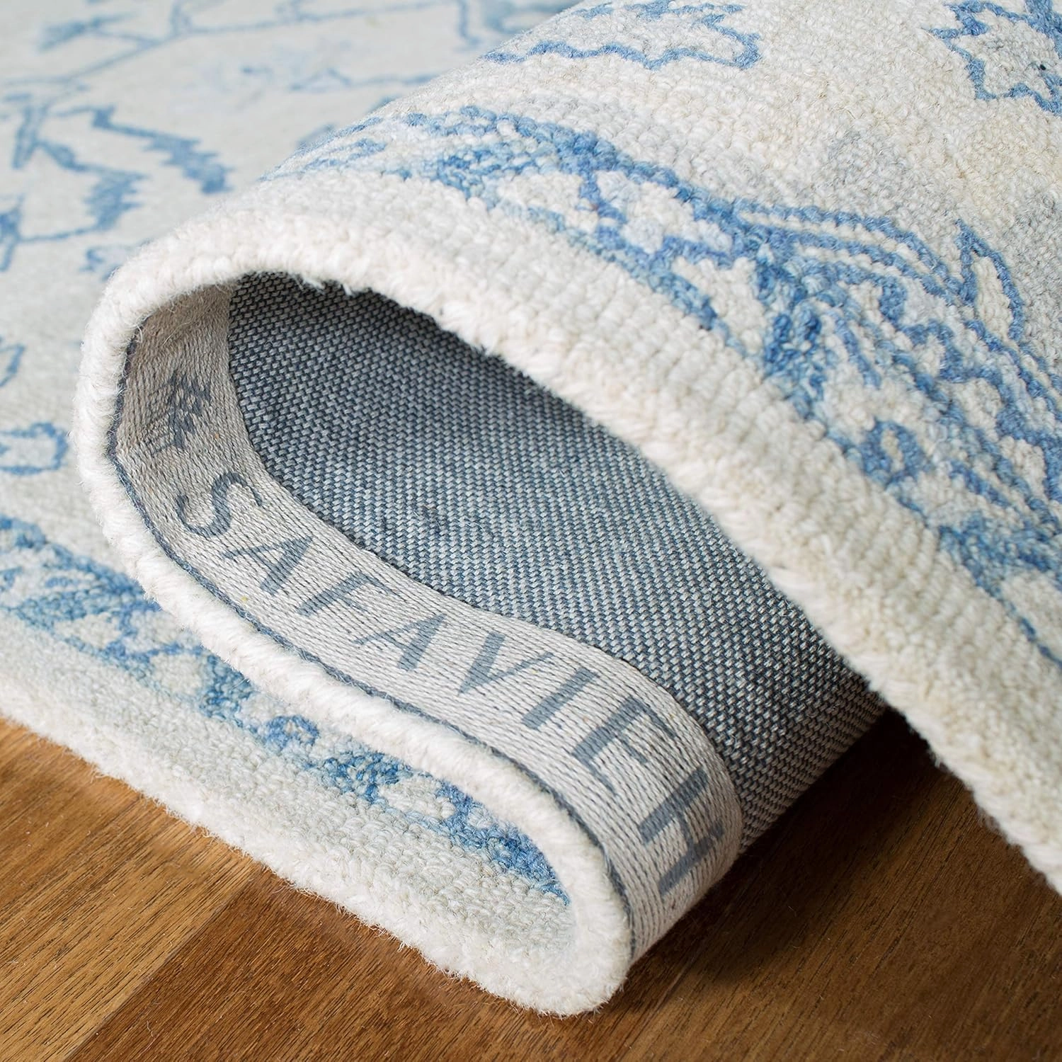 SAFAVIEH Micro-Loop Collection Area Rug - 8' x 10', Ivory & Blue, Handmade Shabby Chic Medallion Wool, Ideal for High Traffic Areas in Living Room, Bedroom (MLP503G)