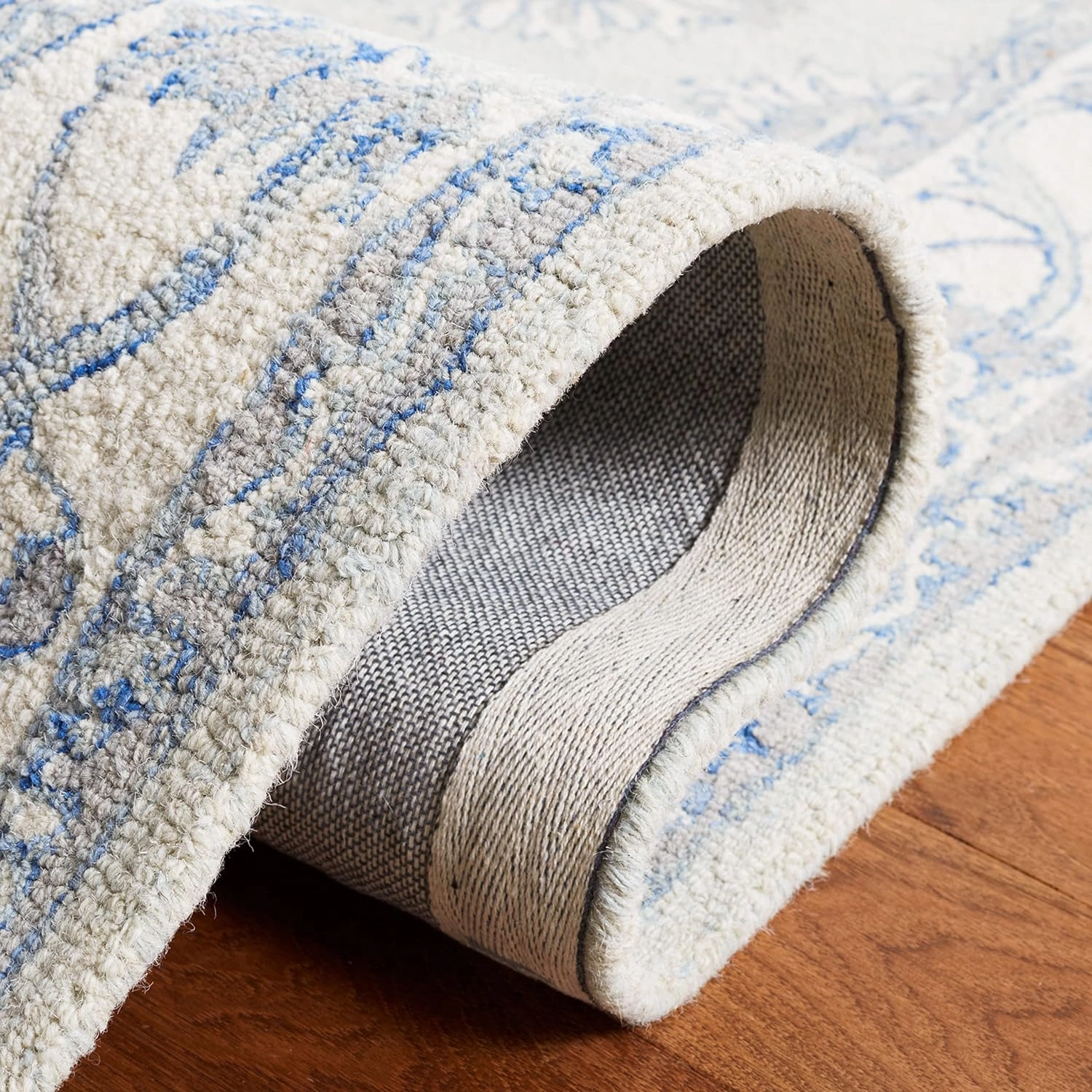 SAFAVIEH Micro-Loop Collection Area Rug - 9' x 12', Light Blue & Ivory, Handmade Wool, Ideal for High Traffic Areas in Living Room, Bedroom (MLP536L)