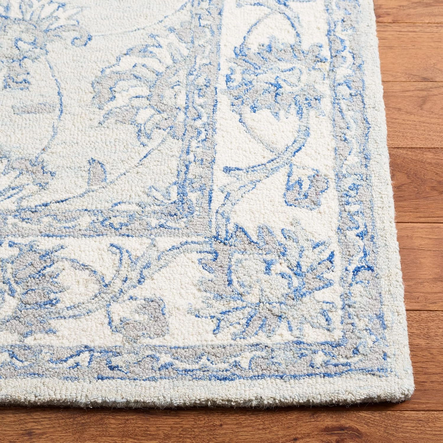 SAFAVIEH Micro-Loop Collection Area Rug - 9' x 12', Light Blue & Ivory, Handmade Wool, Ideal for High Traffic Areas in Living Room, Bedroom (MLP536L)